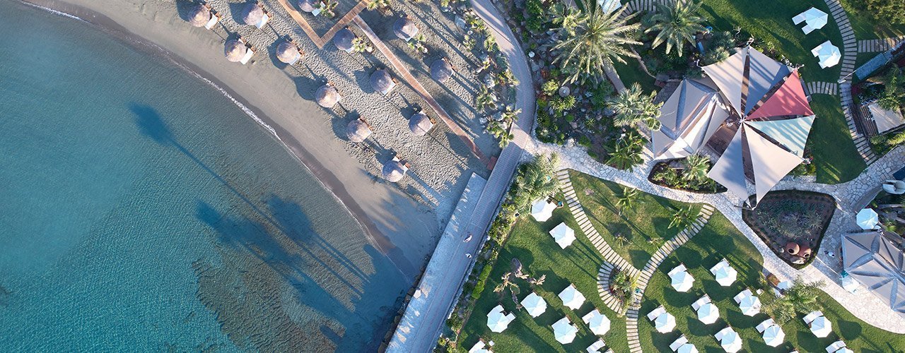 Amathus Beach Hotel Limassol seafront gardens and pool — photo 1